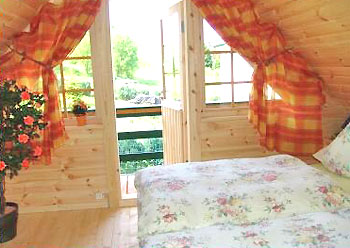 Schlafzimmer mit Balkon